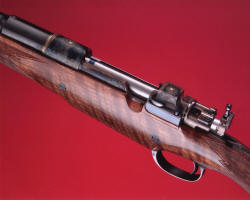 Steve Heilmann Dangerous game rifle engraved in small scroll by Barry Lee Hands Top LH view copyright 2008